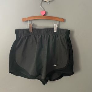 Black and gray Nike running shorts